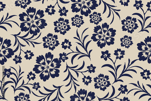 Chic seamless floral pattern with navy blue flowers and leaves on a beige background, ideal for fabric, wallpaper, stationery, and modern textile designs.