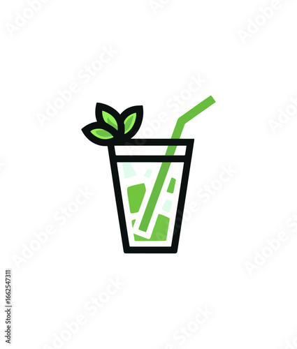 Refreshing green beverage in glass with straw and mint