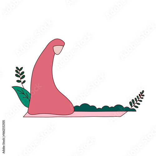 Muslim woman praying on a prayer mat with foliage