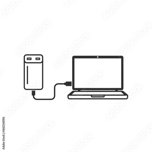 Laptop connected to a power bank for charging.