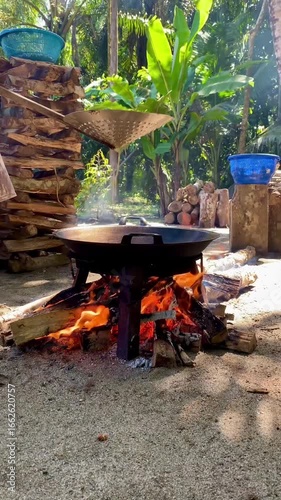  cooking food in the traditional way with firewood