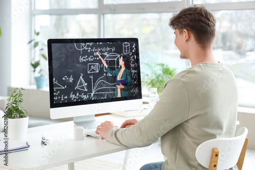 Male student studying Math ...