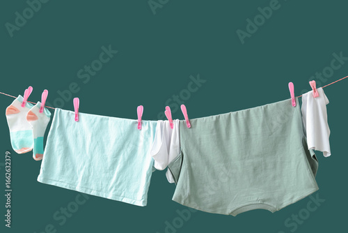 Clean clothes hanging on ro...