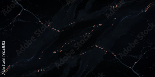Luxurious marble texture with a predominantly black background and flowing patterns with golden veins running through it, creating a striking contrast.	