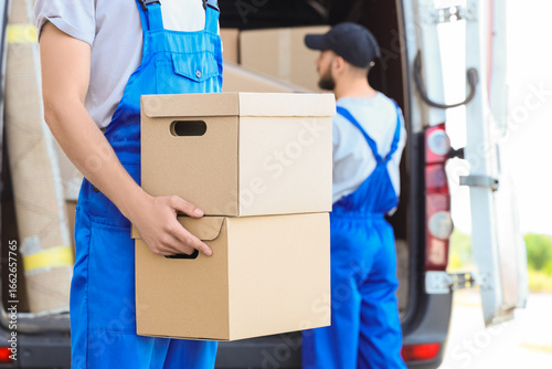 Male mover with boxes from ...