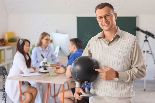 Male Geography teacher with...