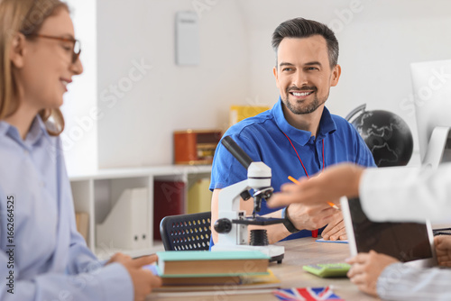 Male PE teacher with his co...