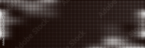 Grunge halftone gradient background. Faded dotted grit noise texture. Black and white rasterized sand wallpaper. Retro pixelated bitmap backdrop.