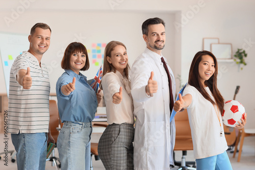 Group of teachers showing t...