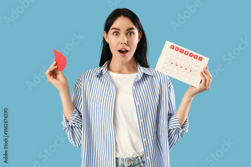 Surprised young woman with ...