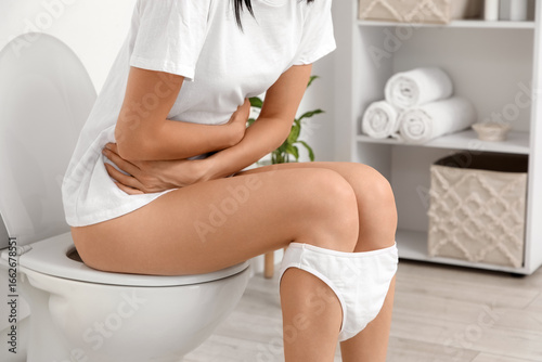 Young woman suffering from ...