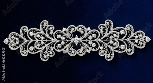 Exquisite filigree accessory adorned with shimmering crystals on deep blue backdrop presents a refined elegance