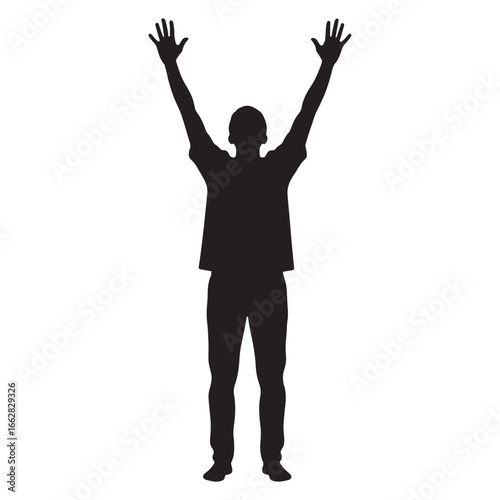 Silhouette of person standing with raised arms
