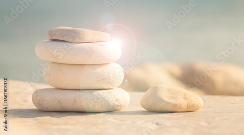 harmony and positive thinking concept. Stack of stable pebble stones. Tranquility, balance of body, mind, soul and spirit. Mental health practice