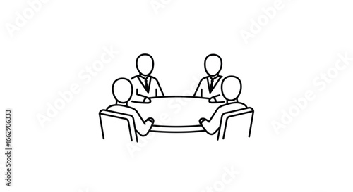Four people are sitting around a table in a meeting