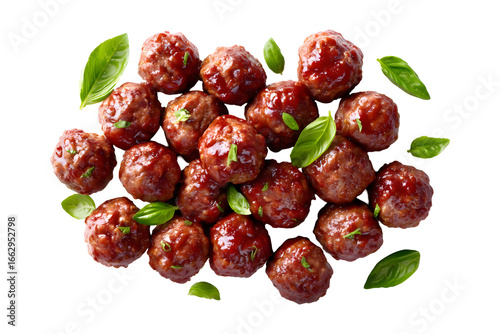 Delicious homemade meatballs with fresh basil isolated against a transparent background