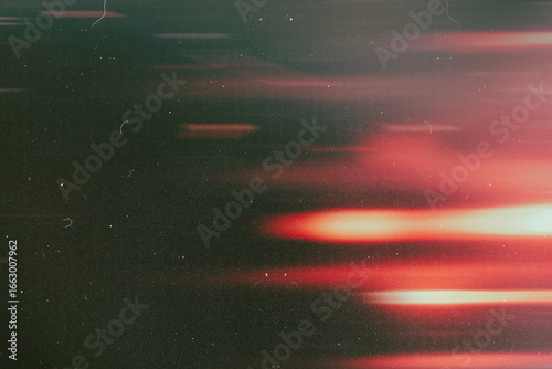 light leak overlay effect with scratch dust and motion blur red light leaks,retro noisy film texture light leak flare on black background,abstract background with ray,grunge film strip background