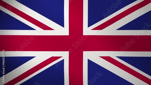 Flag of the United Kingdom fluttering in the wind, looped background. Flag UK waving in wind. Concept of national day and occasions in the country.