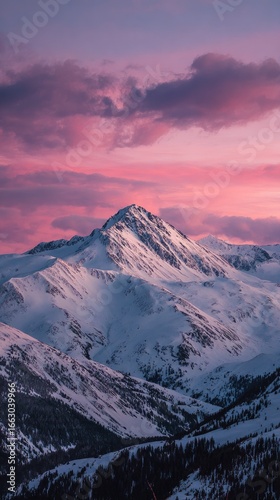 Snowy mountain peak at vibrant sunset (1)