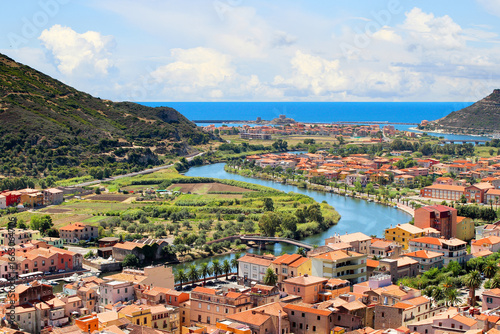 The village of Bosa, Sardinia. Panorama of the city of Bosa with the mouth of the river Temo on the Mediterranean, Italy.