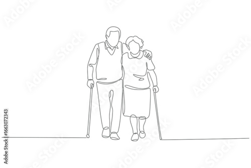 Elderly couple walking together with walking sticks