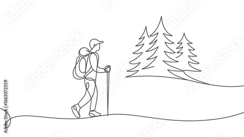 Hiker with backpack and poles walks through snowy landscape with trees