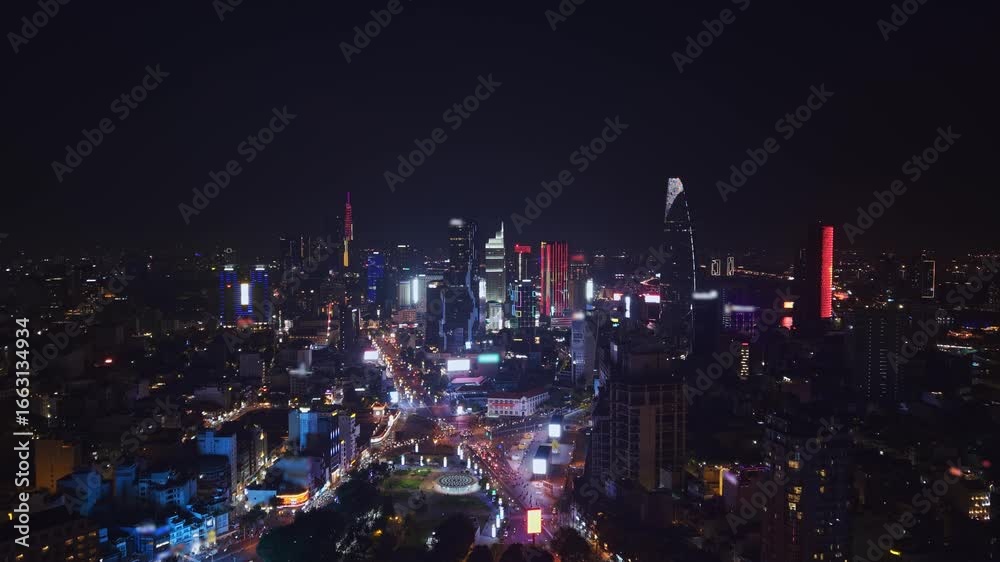 custom made wallpaper toronto digitalAerial night view Ho chi minh city or Saigon in Vietnam, illuminated of business center with skyscrapers.