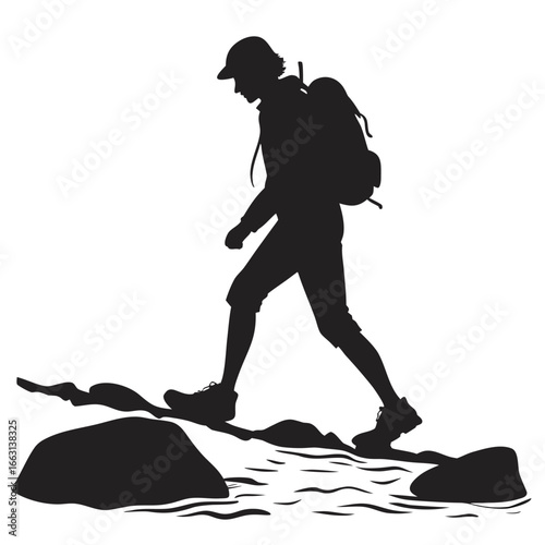 Hiker crossing river silhouette