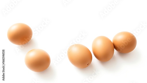 Fresh brown eggs on a white background, emphasizing simplicity and natural food.