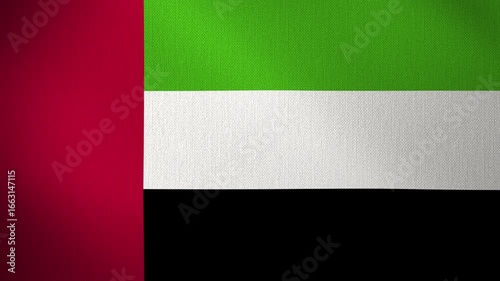 UAE flag fluttering in the wind, looped background. Flag waving in wind. Concept of national day and occasions in the country.