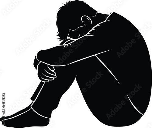 Silhouette of a sad man sitting with his head down, conveying feelings of sadness, depression, and loneliness