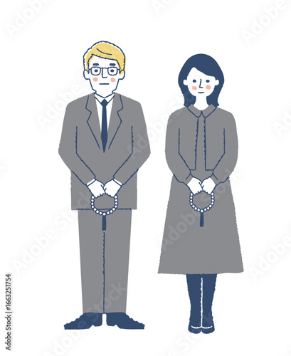 葬儀の参列者・数珠を持っている喪服姿の男女