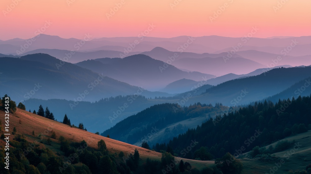 Fototapeta premium serene sunrise landscape with hills in soft yellow and pink tones