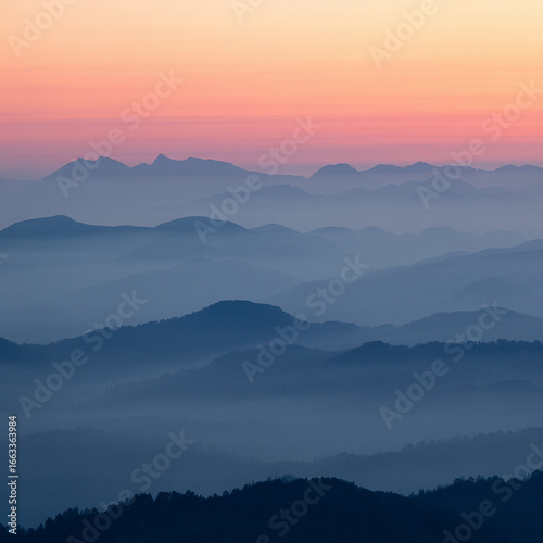Serene Misty Mountains at Sunrise, tranquil landscape photography