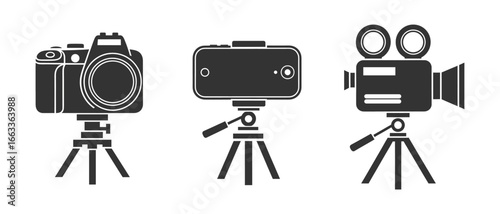 Set of three cameras on tripods, including a digital camera, smartphone and vintage camera isolated on white background