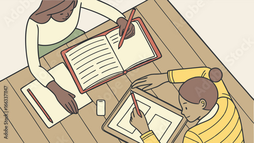 Two People Working on a Wooden Table with Notebooks and Digital Tablet.