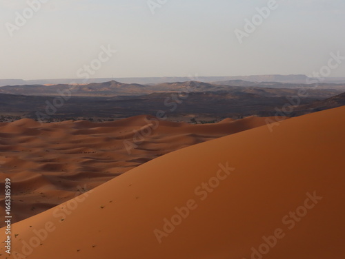 Golden Sand Dunes of the Sahara Desert in Merzouga, Morocco