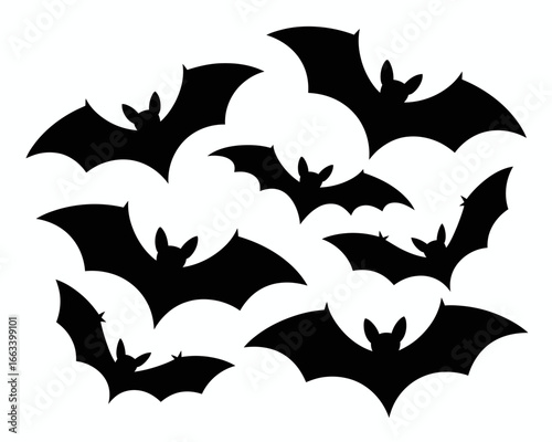 A flock of black bat silhouettes flying together isolated on white background