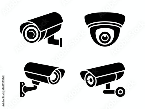 Collection of four black security camera silhouettes isolated on white background