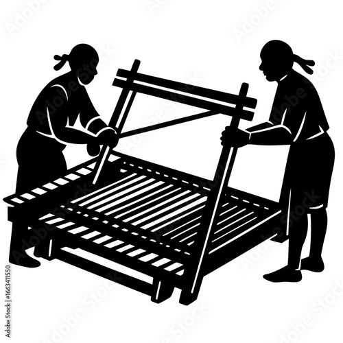 Two women working together to assemble a wooden bed frame