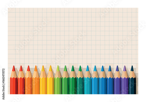 Colorful pencils aligned on graph paper background for creative design and art inspiration
