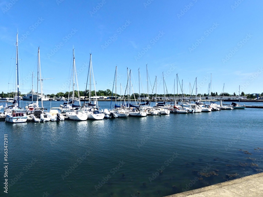 Fototapeta premium Lorient, August 2025 - Visit the beautiful city of Lorient in Brittany - View of the port 