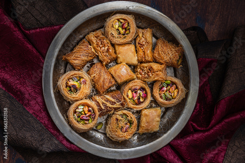 Murais de parede Traditional turkish, arabic sweets baklava assortment with pistachio