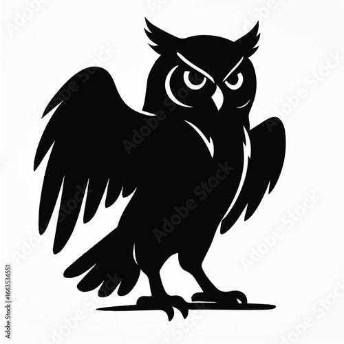 Black Owl Silhouette Standing on Perch