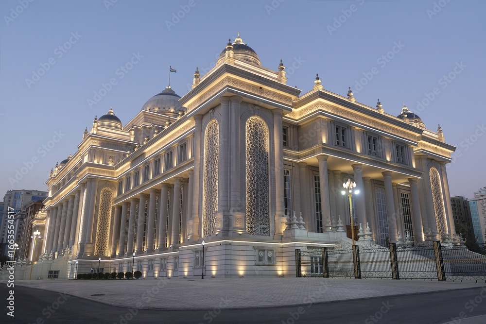 Obraz premium Dushanbe, Tajikistan - Scenery of center of Dushanbe, capital of Tajikistan. New building of the Parliament of Tajikistan with evening illuminations.