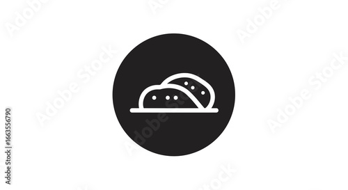 Simple black and white icon of bread loaf in circular design