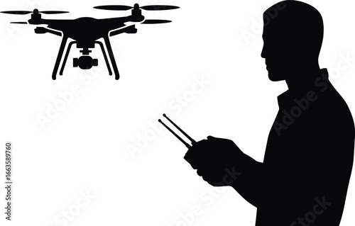 Silhouette of a man controlling a drone with a remote