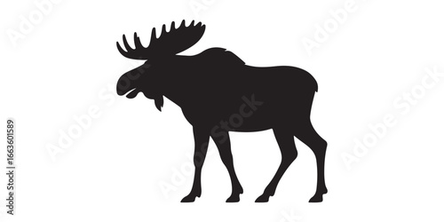 Silhouette of a majestic bull moose with large antlers standing proudly