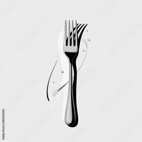 A stylish black and white fork stands out against a pristine background, showcasing a modern design that reflects artistry and sophistication in culinary presentation.