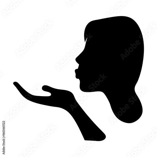 Silhouette of a woman blowing a kiss, a sign of love